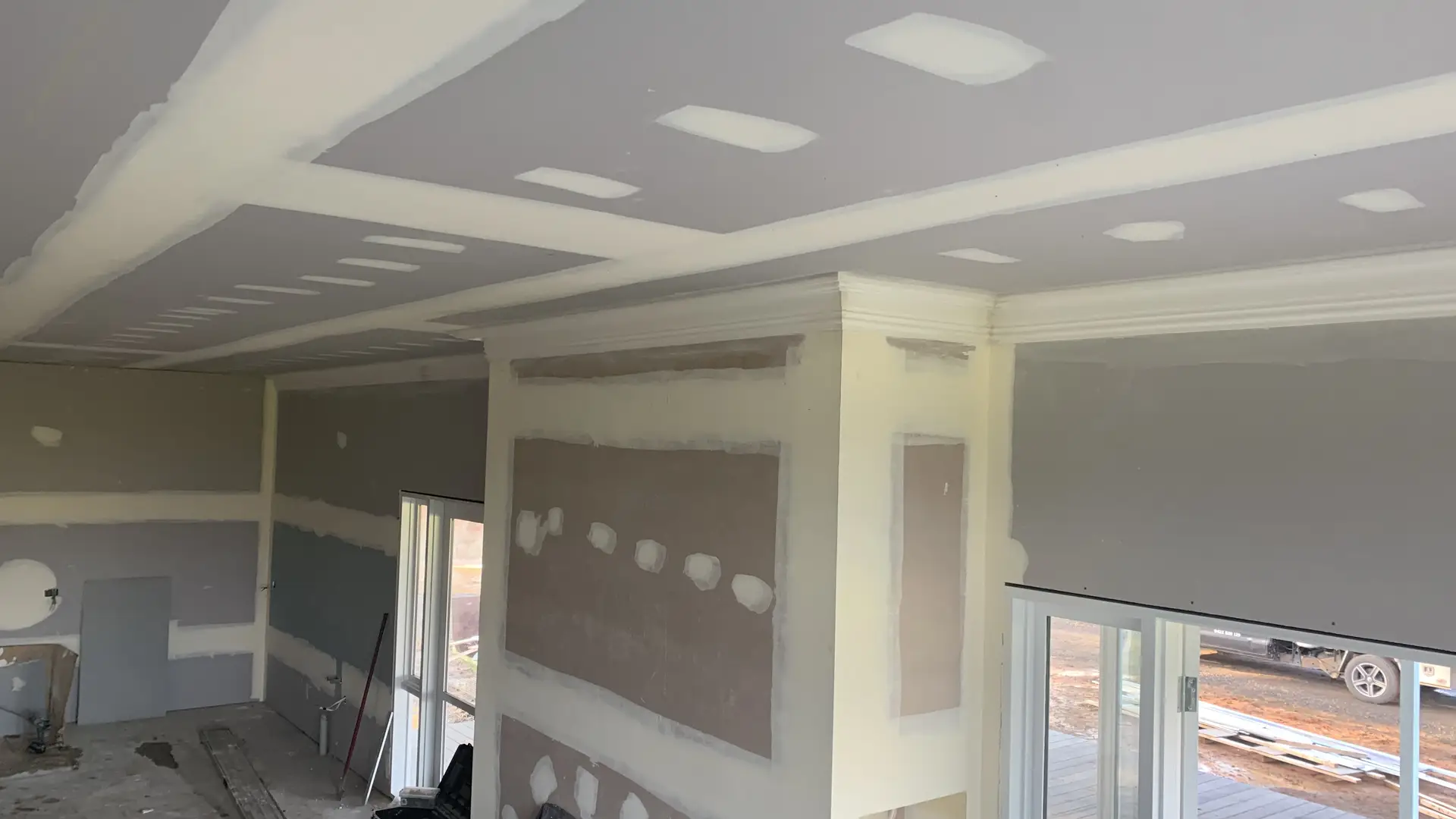 Repaired and replaced cornice section matching existing profile in Seymour home
